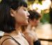 Woman practicing mindfulness meditation with closed eyes in serenity